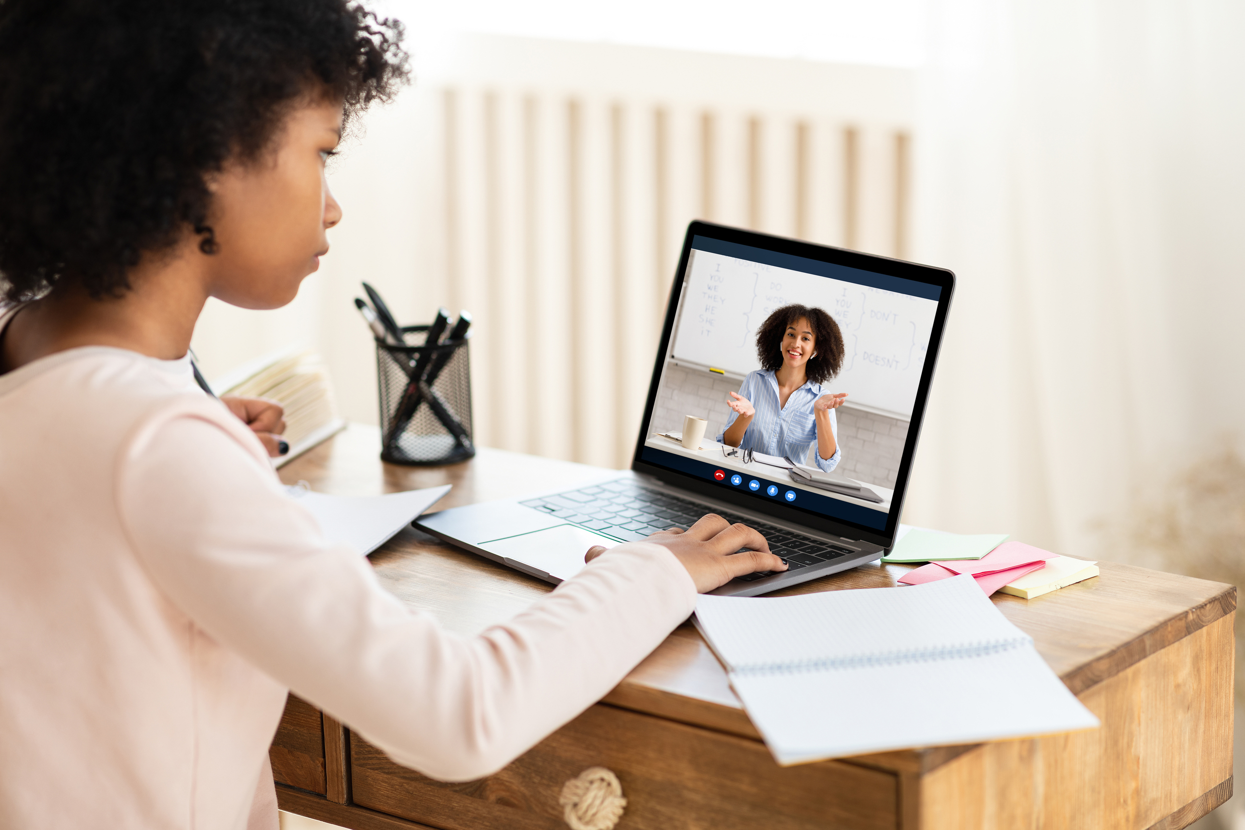 african schoolgirl at laptop hav